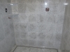 Carrara Marble shower with linear drain