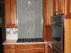 Kitchen backsplash with glass tile
